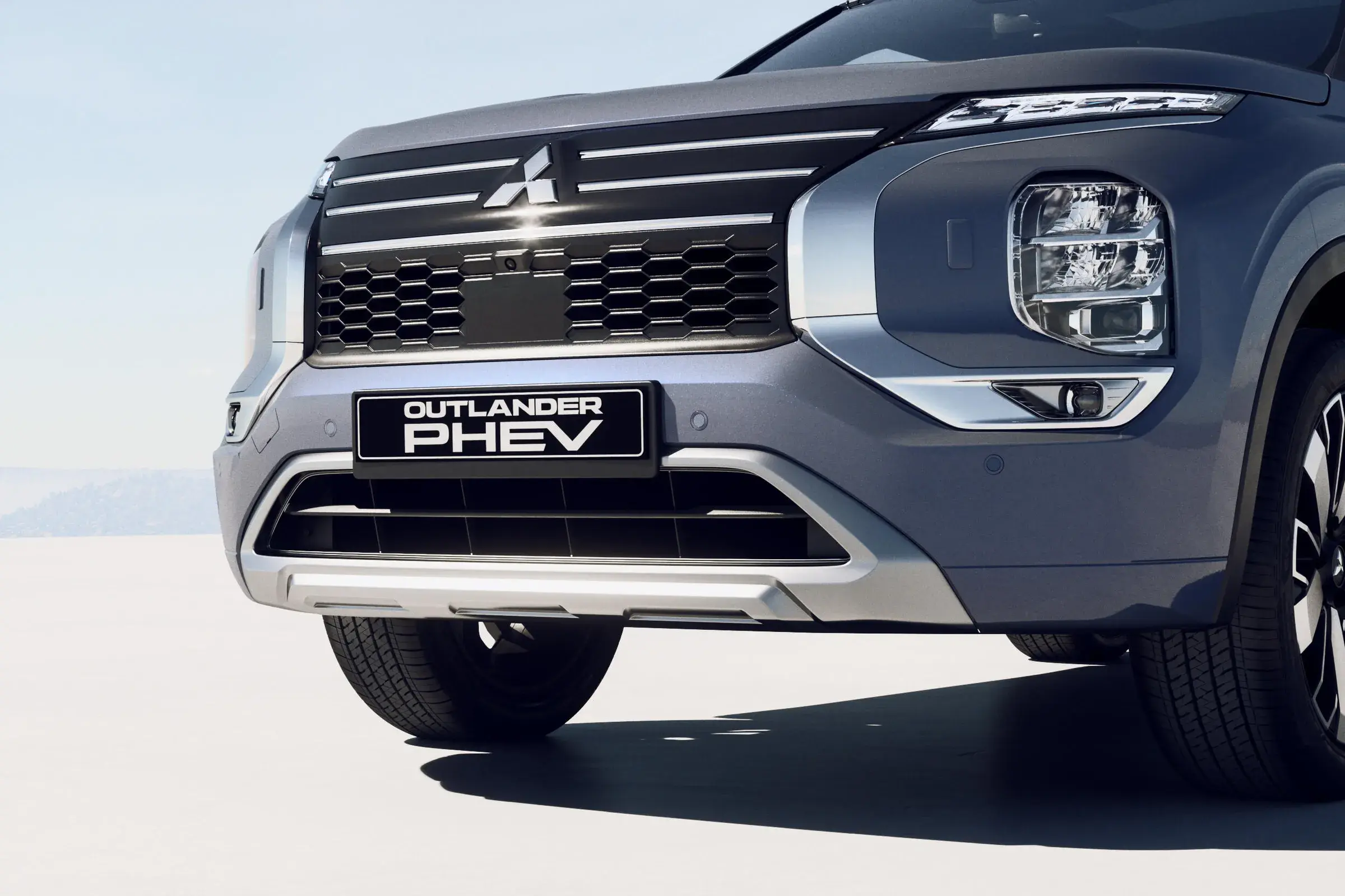 25MY_OutlanderPHEV_Instyle_Bumper front_proxy_Mitsubishi_opt Zaparkowany samochód Mitsubishi Eclipse Cross PHEV